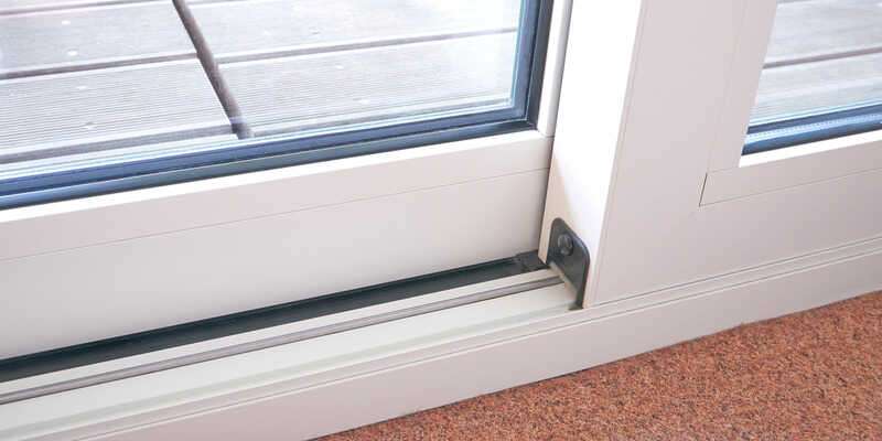 How to Fix a Sticky Sliding Glass Door - Tighten the screws